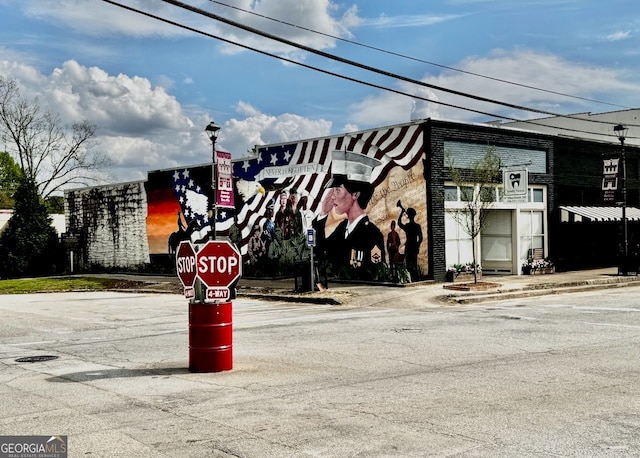 262 E Main St, Rutledge, GA 30663 - view of road featuring traffic signs, sidewalks, street lights, and curbs