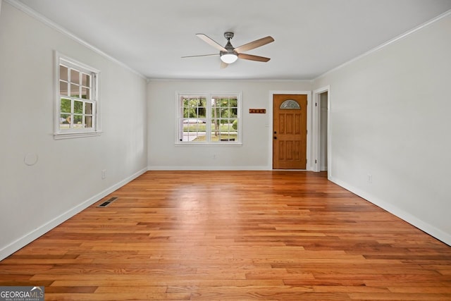 262 E Main St, Rutledge, GA 30663 - spare room with a ceiling fan, baseboards, ornamental molding, visible vents, and light wood-style floors