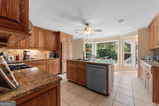 kitchen featuring dishwasher, a sink, a ceiling fan, decorative backsplash, and ornamental molding