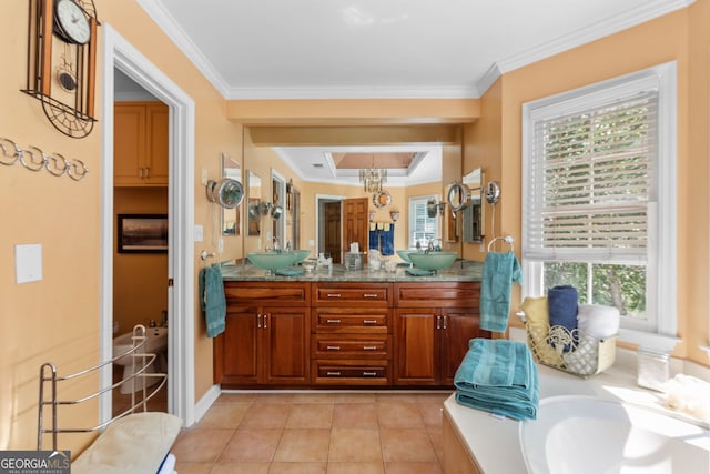 bathroom with double vanity, ornamental molding, tile patterned floors, and baseboards