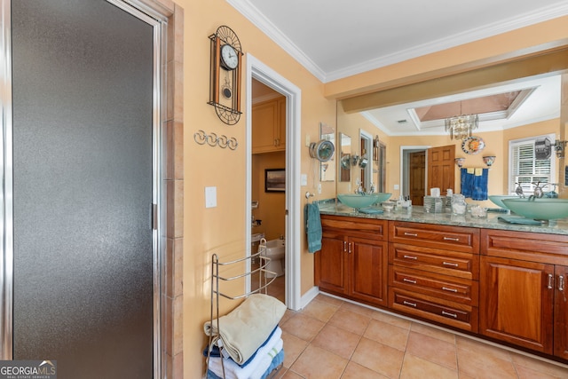 bathroom with crown molding, tile patterned flooring, double vanity, a stall shower, and a tray ceiling