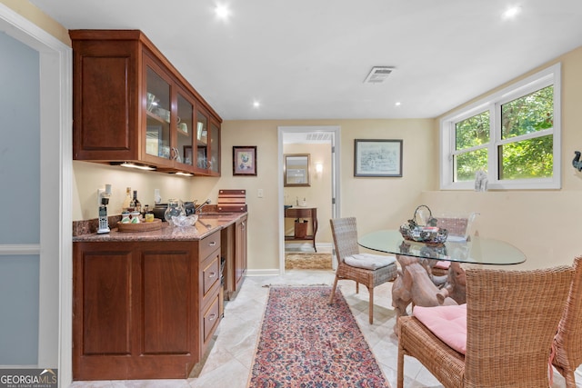 dining space featuring recessed lighting