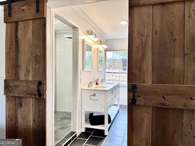 bathroom with vanity and tile patterned floors