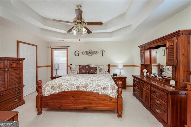 209 Red Fern Ct, Canton, GA 30114 - bedroom with light carpet, a tray ceiling, a ceiling fan, and baseboards