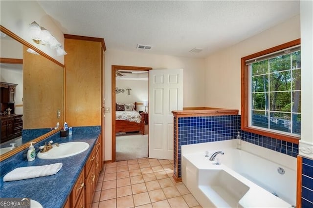 209 Red Fern Ct, Canton, GA 30114 - bathroom with vanity, a bath, ensuite bath, and tile patterned flooring