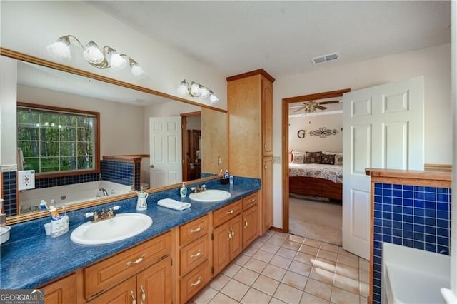 209 Red Fern Ct, Canton, GA 30114 - full bathroom with a garden tub, tile patterned flooring, double vanity, and a ceiling fan