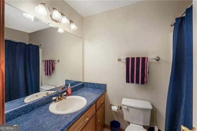 209 Red Fern Ct, Canton, GA 30114 - full bathroom with toilet, vanity, and curtained shower