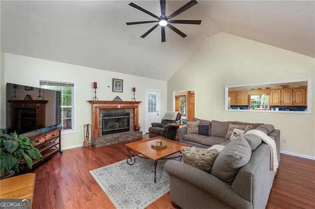 209 Red Fern Ct, Canton, GA 30114 - living room with a fireplace, ceiling fan, wood finished floors, baseboards, and high vaulted ceiling