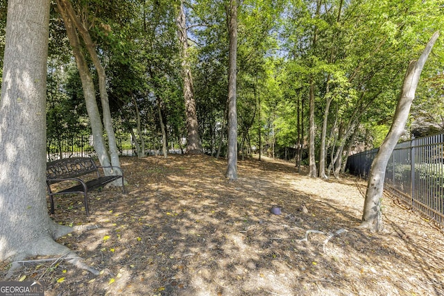 view of property's community with fence