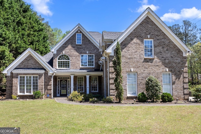 774 Mary Ann Dr NE, Marietta, GA 30068 - view of front of home featuring a front lawn and brick siding