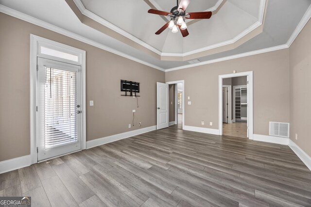 774 Mary Ann Dr NE, Marietta, GA 30068 - empty room featuring visible vents, a tray ceiling, wood finished floors, and ceiling fan