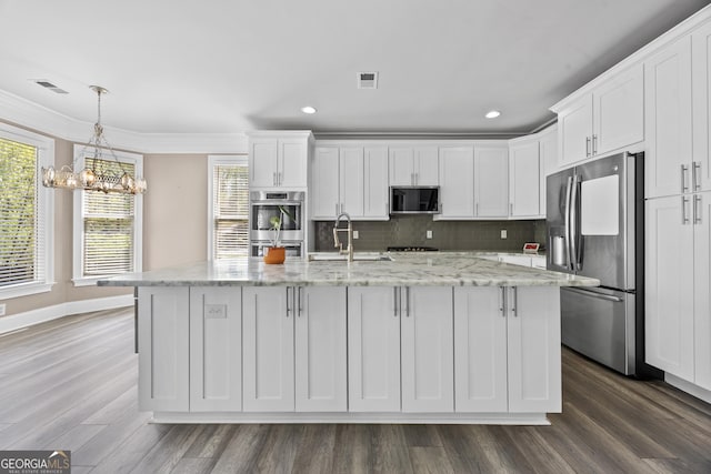 774 Mary Ann Dr NE, Marietta, GA 30068 - kitchen featuring visible vents, a sink, a chandelier, white cabinetry, and stainless steel appliances