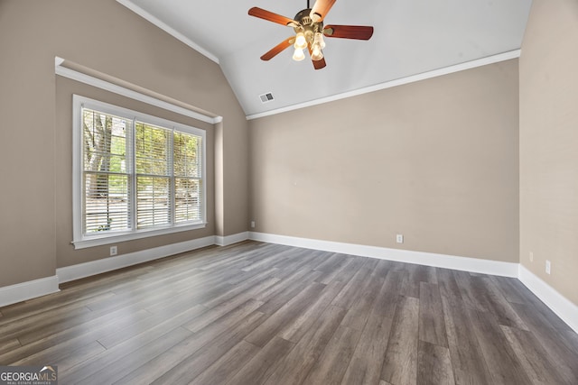 774 Mary Ann Dr NE, Marietta, GA 30068 - spare room with dark wood finished floors, a ceiling fan, visible vents, lofted ceiling, and baseboards