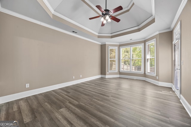 774 Mary Ann Dr NE, Marietta, GA 30068 - unfurnished room featuring a ceiling fan, crown molding, visible vents, a raised ceiling, and wood finished floors