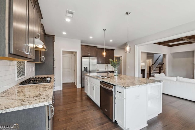 214 Leland Way, Woodstock, GA 30188 - kitchen featuring dark wood-type flooring, dark brown cabinets, recessed lighting, appliances with stainless steel finishes, and decorative backsplash