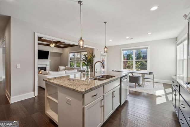 214 Leland Way, Woodstock, GA 30188 - kitchen with stainless steel dishwasher, a wealth of natural light, baseboards, and a sink