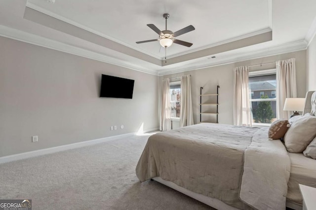 214 Leland Way, Woodstock, GA 30188 - carpeted bedroom featuring baseboards, a raised ceiling, crown molding, visible vents, and ceiling fan