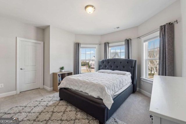 214 Leland Way, Woodstock, GA 30188 - bedroom with visible vents, multiple windows, baseboards, and carpet floors