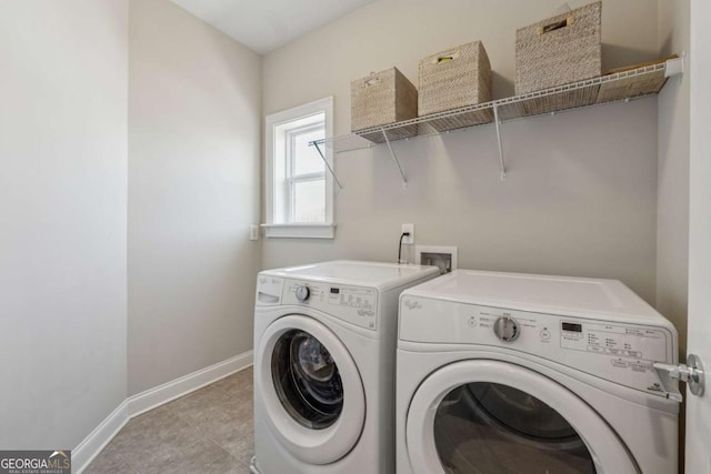 214 Leland Way, Woodstock, GA 30188 - laundry room featuring independent washer and dryer, light tile patterned floors, laundry area, and baseboards