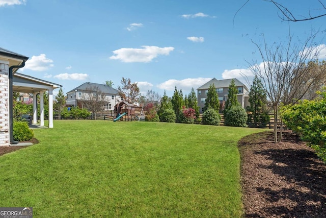 214 Leland Way, Woodstock, GA 30188 - view of yard with a playground