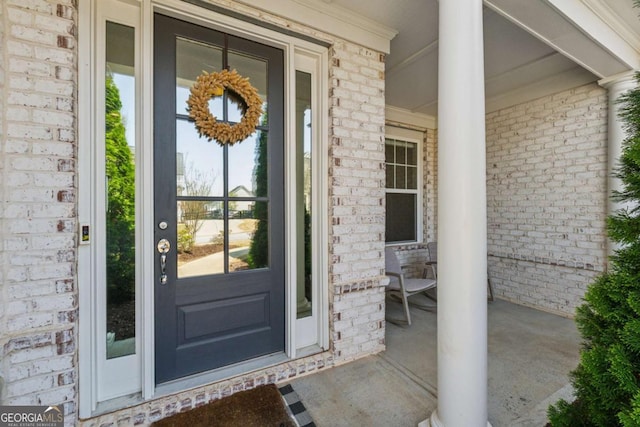 214 Leland Way, Woodstock, GA 30188 - property entrance featuring brick siding and covered porch