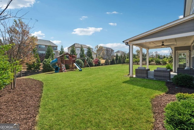 214 Leland Way, Woodstock, GA 30188 - view of yard with fence, playground community, and ceiling fan