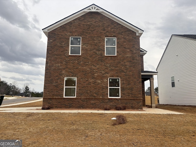 5301 Tolar Rd Unit 95, South Fulton, GA 30213 - view of side of home with brick siding and a lawn