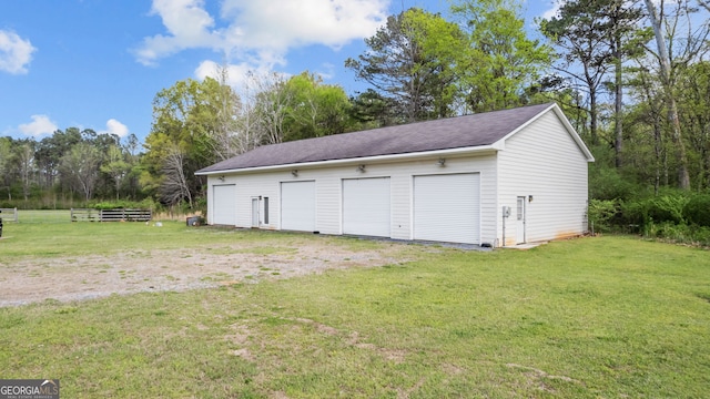 745 Pleasant Valley Rd SE, Silver Creek, GA 30173 - detached garage featuring view of wooded area