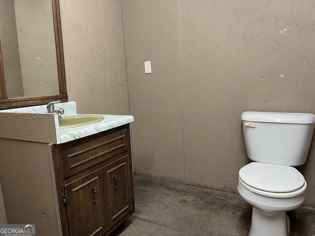 745 Pleasant Valley Rd SE, Silver Creek, GA 30173 - half bathroom with vanity, unfinished concrete floors, and toilet