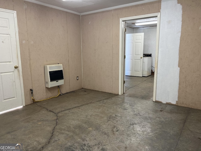 745 Pleasant Valley Rd SE, Silver Creek, GA 30173 - empty room featuring heating unit, washer / dryer, unfinished concrete floors, and ornamental molding