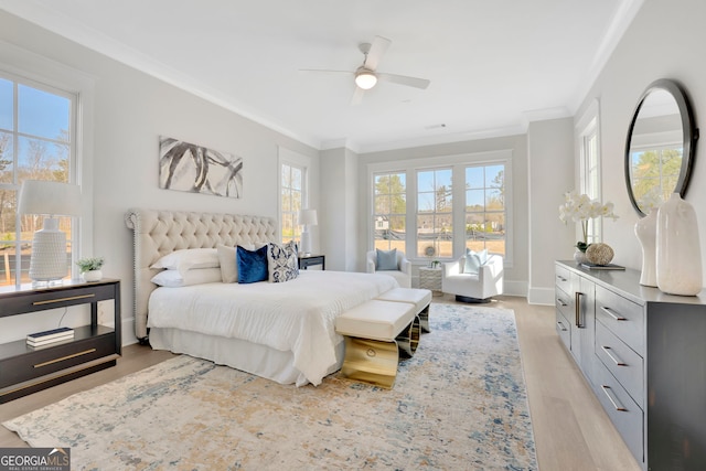 123 Candler Loop, Acworth, GA 30101 - bedroom with crown molding, multiple windows, light wood-style floors, and ceiling fan