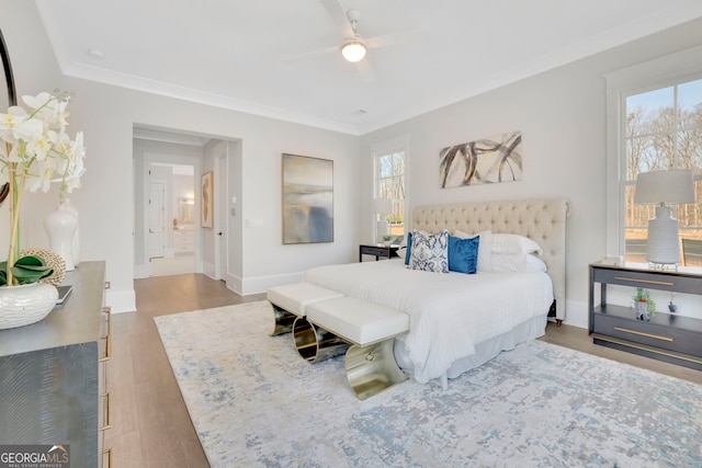 123 Candler Loop, Acworth, GA 30101 - bedroom featuring multiple windows, wood finished floors, ornamental molding, and a ceiling fan
