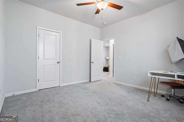 75 Glen Abbey Cir, Fairburn, GA 30213 - unfurnished bedroom featuring baseboards, a ceiling fan, and carpet floors