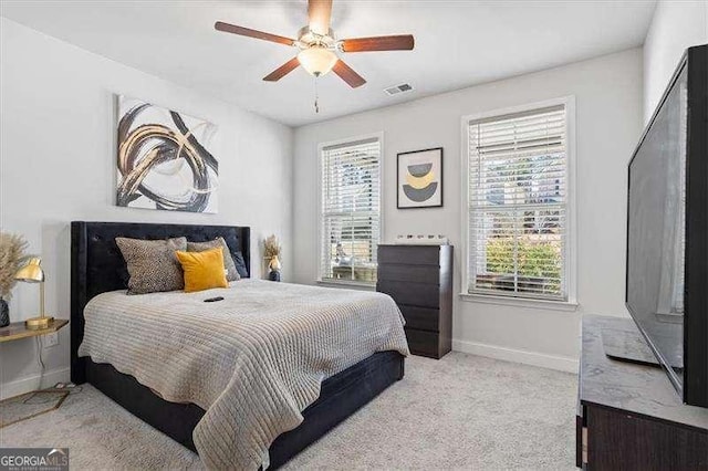 75 Glen Abbey Cir, Fairburn, GA 30213 - carpeted bedroom featuring ceiling fan, baseboards, and visible vents