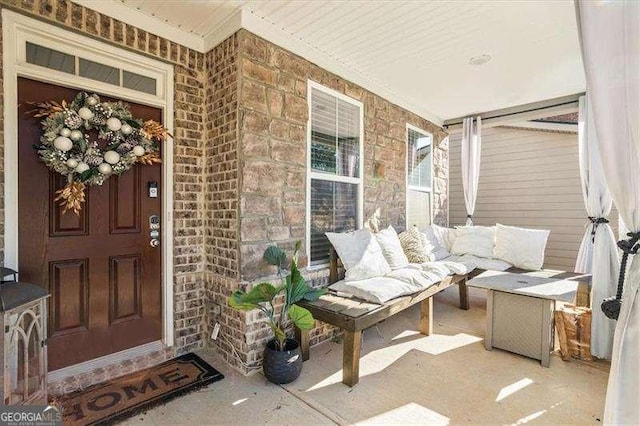75 Glen Abbey Cir, Fairburn, GA 30213 - doorway to property with a porch and stone siding