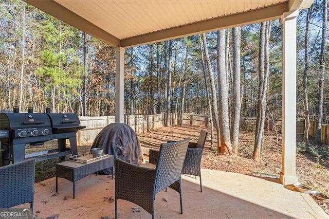 75 Glen Abbey Cir, Fairburn, GA 30213 - view of patio / terrace featuring a fenced backyard