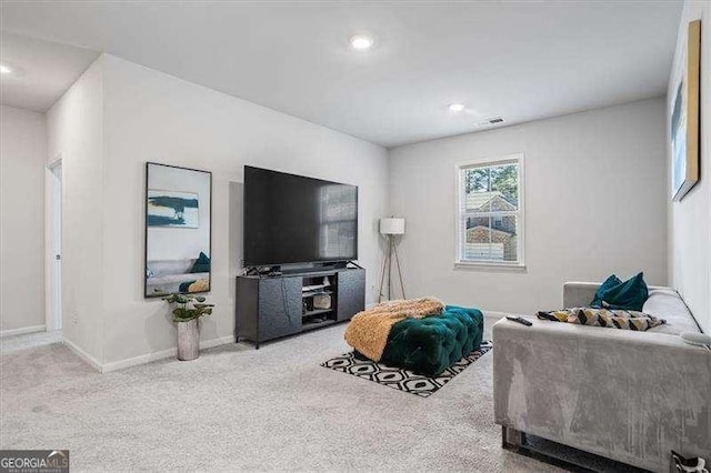 75 Glen Abbey Cir, Fairburn, GA 30213 - living area with visible vents, baseboards, and carpet floors