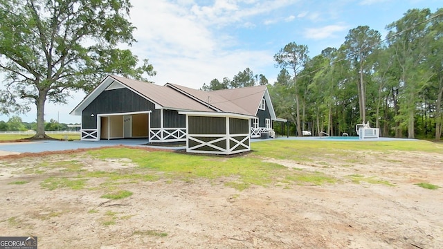 view of outbuilding featuring an outdoor structure and an exterior structure