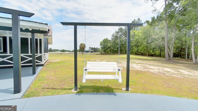 view of home's community with a yard