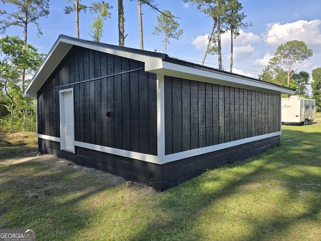 view of home's exterior featuring a lawn