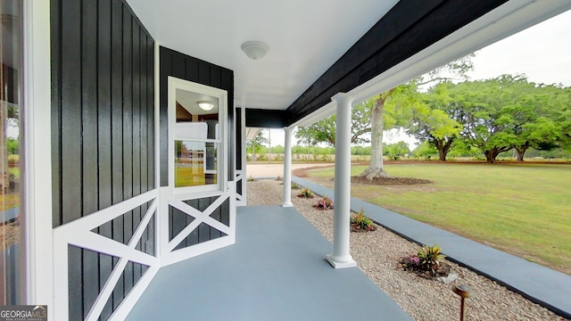 view of patio featuring a porch