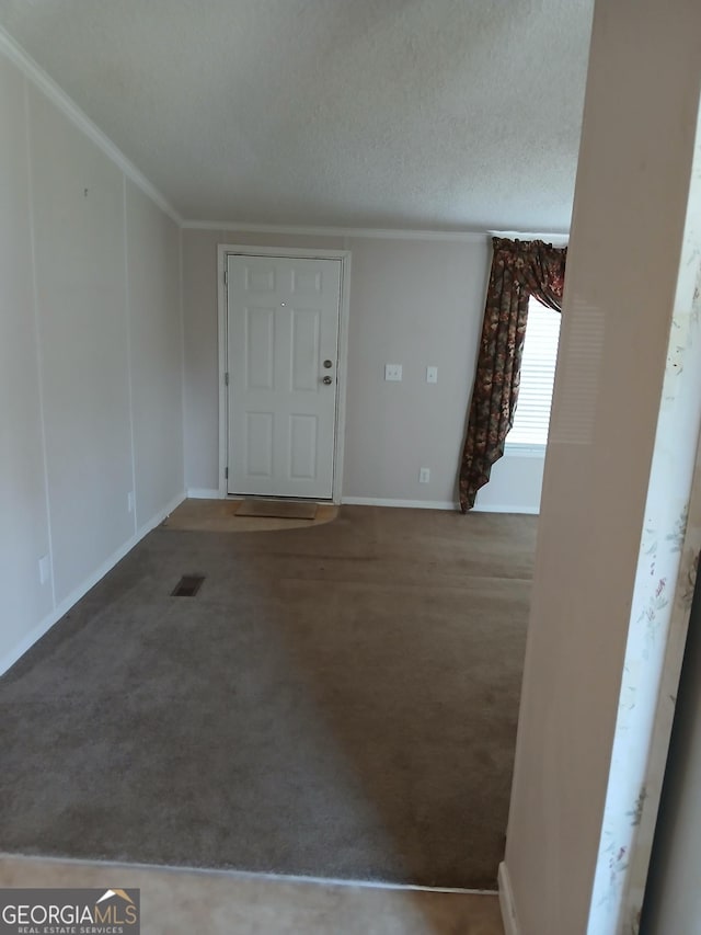 2791 Pulaski Rd, Statesboro, GA 30458 - kitchen featuring ceiling fan, a textured ceiling, crown molding, a sink, and light countertops