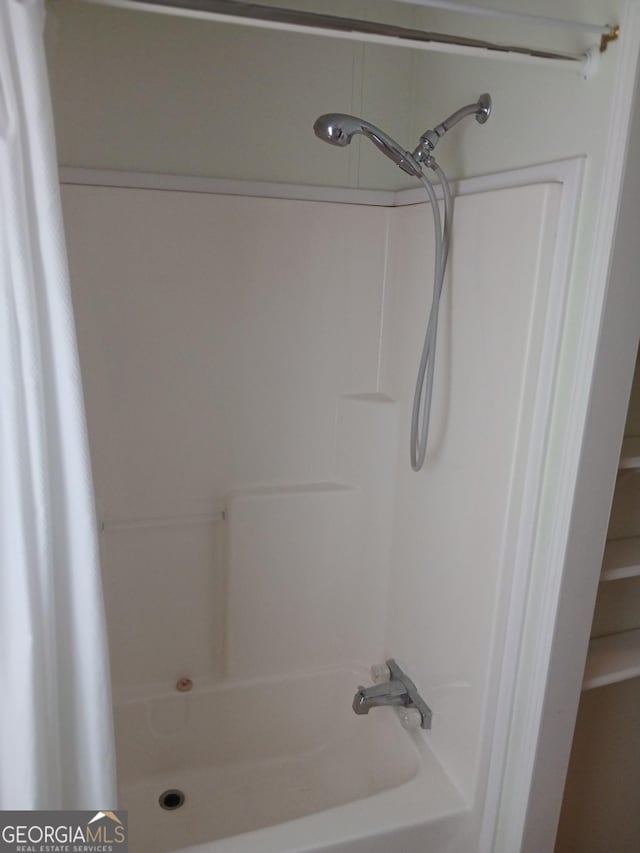 2791 Pulaski Rd, Statesboro, GA 30458 - bathroom with a shower with shower curtain, double vanity, and a sink