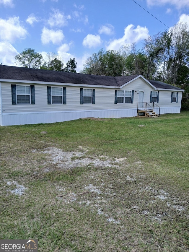 2791 Pulaski Rd, Statesboro, GA 30458 - manufactured / mobile home featuring a front lawn