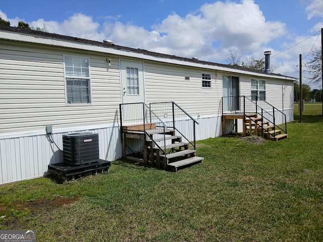 2791 Pulaski Rd, Statesboro, GA 30458 - back of property with a yard and cooling unit