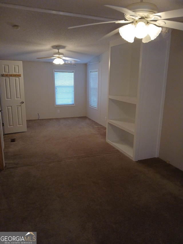 2791 Pulaski Rd, Statesboro, GA 30458 - carpeted empty room featuring ceiling fan