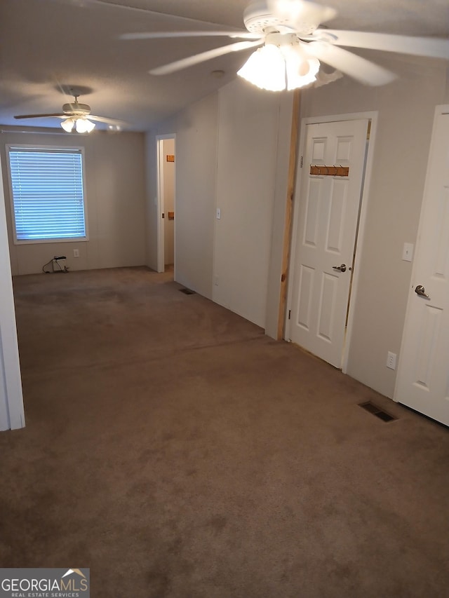 2791 Pulaski Rd, Statesboro, GA 30458 - carpeted spare room with ceiling fan and visible vents
