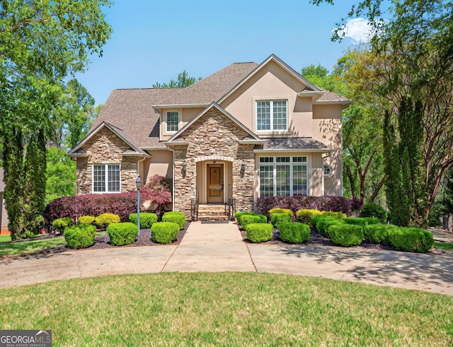 804 Eagleview, Anderson, SC 29625 - view of front of house with stucco siding, stone siding, and a front yard