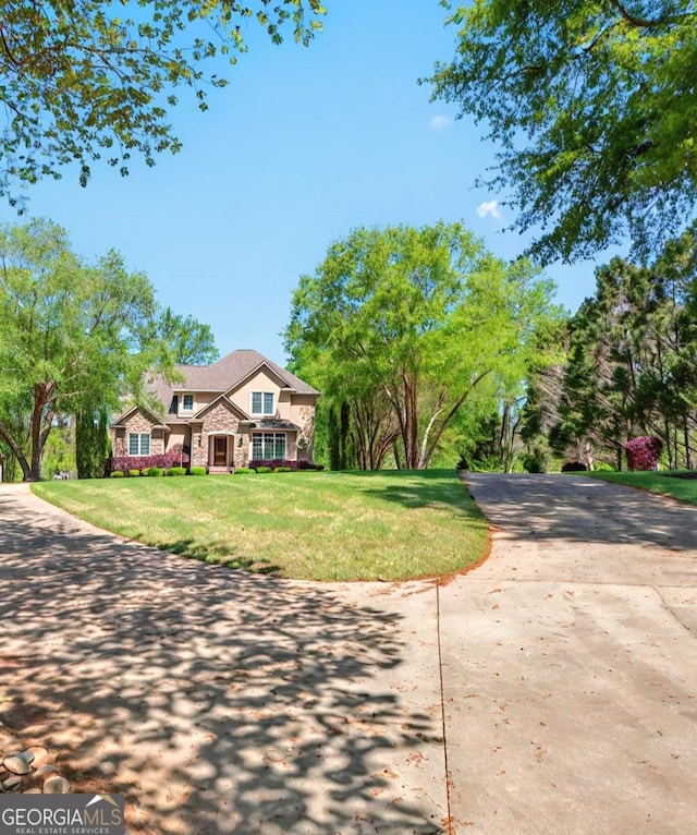 804 Eagleview, Anderson, SC 29625 - view of front of property featuring stone siding, stucco siding, a front lawn, and concrete driveway