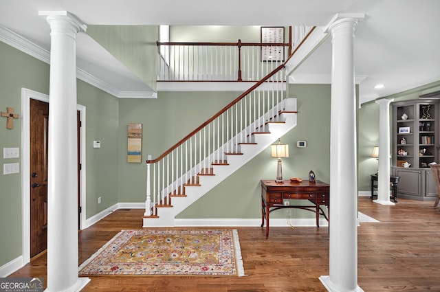 804 Eagleview, Anderson, SC 29625 - foyer entrance with decorative columns, crown molding, wood finished floors, stairs, and recessed lighting